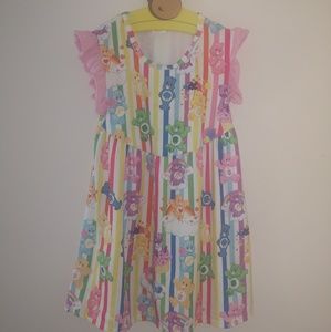 Boutique milksilk carebear dress size 8-9